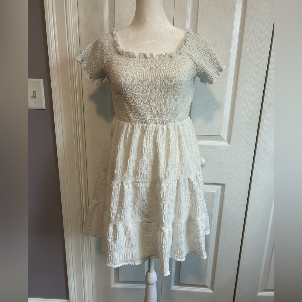 White Mini Sundress with Tiered Skirt and Off-the-Shoulder Neckline - Picture 4 of 12